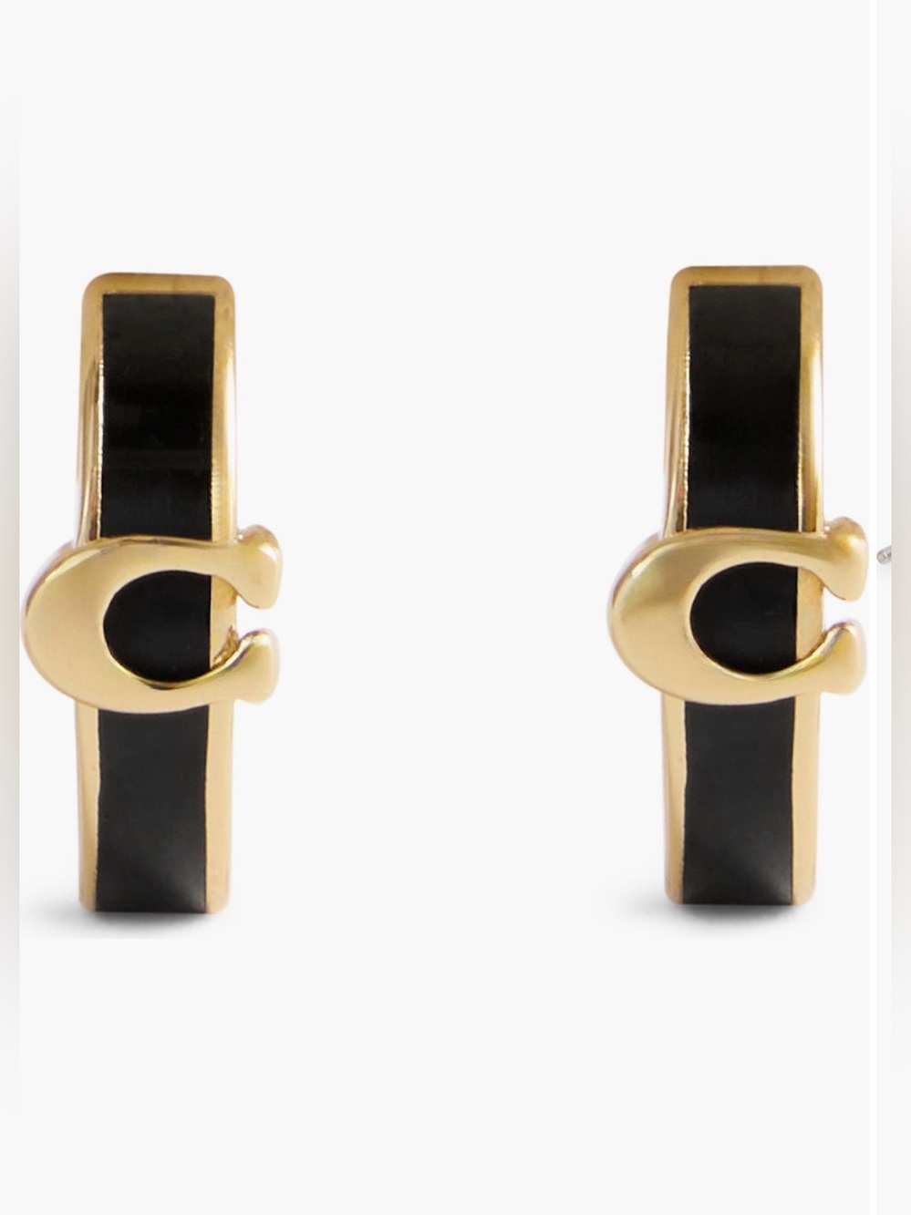 COACH
Signature C Enamel
Huggie Hoop Earrings